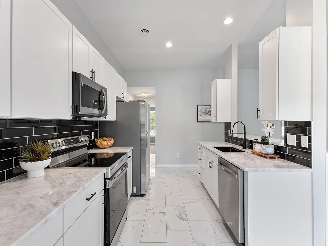 upscale and modern kitchen in modern wilmington rental by Coast and Capital Management